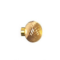 Tom Dixon Whirl Surface Light in gold, illuminated
