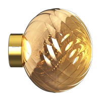 Tom Dixon Whirl Surface Light in gold polished polycarbonate