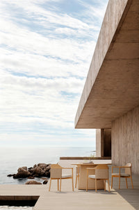Umbra outdoor dining furniture lifestyle image by SKLD Studio, designed by Adam Johnston