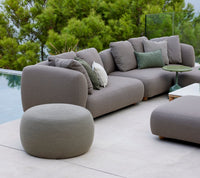 Circle footstool taupe lifestyle image by Cane-line