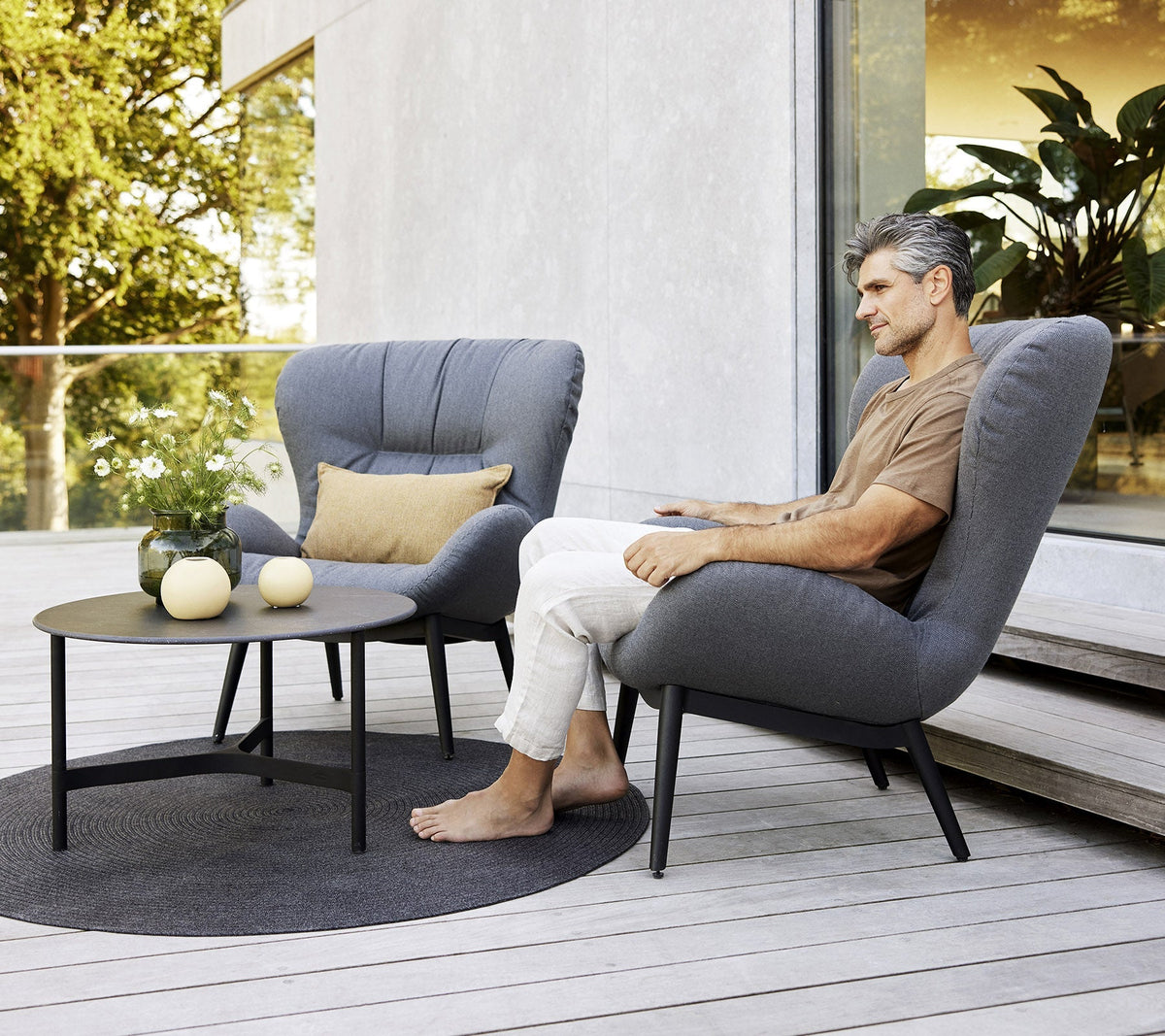 Circle rug outdoor lifestyle image by Cane-line