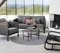 Circle rug outdoor dining lifestyle image by Cane-line