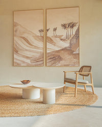 Ari mineral plaster coffee tables in a living room with Titus lounge chair