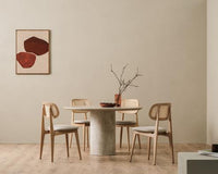 Ari round dining table and Titus chairs wide lifestyle